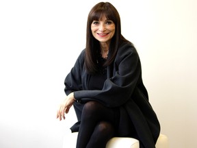 Fashion personality Jeanne Beker shows off her new clothing line "edit" to be sold in Bay stores. (Dave Abel/QMI Agency)