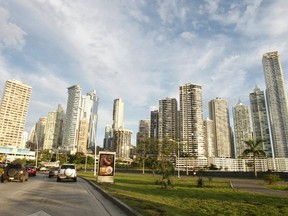 Vehicles drive on a street around the centre of Panama City December 6, 2011. (REUTERS/Henry Romero)