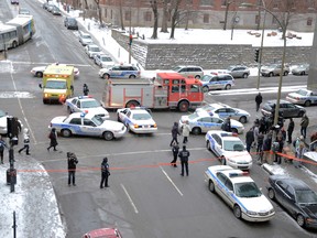 A police officer was stabbed and a suspect was shot in a violent takedown outside a Montreal subway station, Friday, Jan. 6, 2012. (MATHIEU LEBRUN/QMI AGency)