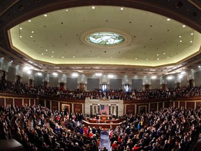 Members of the 112th United States Congress congratulate each other after being sworn in on Capitol Hill in Washington, January 5, 2011. Since the Reagan era, Congress has been stripping away laws and regulations aimed at preventing a repeat of the stock market crash of 1929.
REUTERS