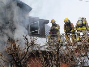 The cause of a fire that left an Ottawa couple homeless on Monday, Jan. 9, 2012 remains under investigation. The blaze, which broke out shortly before 2 p.m., is believed to have started on the second floor of a three-storey Waverley St. century home, before spreading to a third floor and attic. There were no injuries.
(Photo by Ottawa Fire Services)