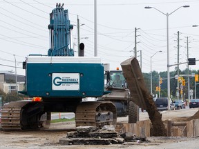 Watermain construction along Woodroffe Ave. The city's parks and recreation department says construction work cut attendance at some city facilities, contributing to a deficit. (ERROL MCGIHON/THE OTTAWA SUN)