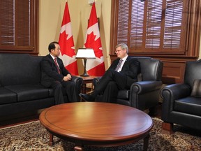 Prime Minister Stephen Harper and Zhang Junsai, Ambassador of China during a photo opportunity in the PM's office in Ottawa Jan 11, 2012. (ANDRE FORGET/QMI AGENCY)