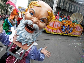 Members of REX march down St. Charles Avenue on Mardi Gras Day in New Orleans, Louisiana March 8, 2011. REUTERS/Sean Gardner
