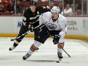 Taylor Hall of the Edmonton Oilers skates with the puck during the second period against the Anaheim Ducks at the Honda Center on November 21, 2010 in Anaheim, California. The Oilers defeated the Ducks 4-2.  (Jeff Gross/Getty Images/AFP)