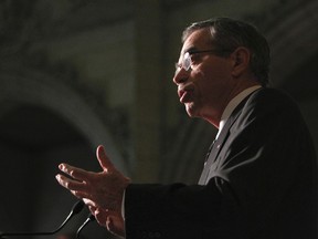 Natural Resources minister Joe Oliver speaks to the media at Parliament Hill in Ottawa Dec 8, 2011 concerning approval for a mine. (ANDRE FORGET/QMI AGENCY)