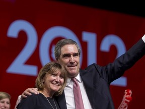 Michael Ignatieff and wife Zsuzsanna Zsohar wave to the crowd of Liberal supporters at the Liberal Convention at the Ottawa Conference Centre in Ottawa, January 13, 2012. (Chris Roussakis/QMI Agency)