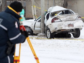 Edmonton Police continue to investigate at the scene of a fatal single vehicle crash along 142 Street south of 118 Avenue, Alberta, Sunday 15, 2012. The lone male occupant of vehicle died in hospital. DAVID BLOOM EDMONTON SUN  QMI AGENCY