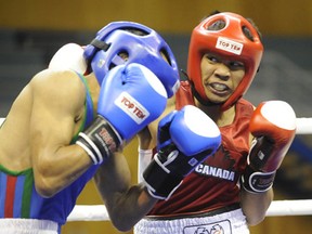 Jonathan Quinit (right) in a match against a boxer from Morocco. (Submitted photo)