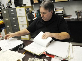 Rick Shaw of Shaw's Auto Service and Parts is out nearly $1 million due to alleged workplace fraud. Shaw, seen here on Jan. 16, 2012, won a judgement in court ordering the money be repaid. (James Turner, Winnipeg Sun)