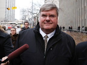 Former Nortel CFO Douglas Beatty leaves 361 University courthouse after the first day of his trial Monday, January 16, 2012. (Craig Robertson/Toronto Sun)