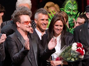 Bono, left, and Julie Taymor at the 'Spider-Man: Turn Off The Dark' Broadway opening curtain call in New York City, June 14, 2011. (WENN.COM)