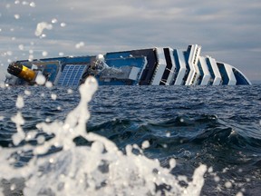 A view of the Costa Concordia cruise ship that ran aground off the west coast of Italy, at Giglio island, January 18, 2012. (REUTERS/Max Rossi)