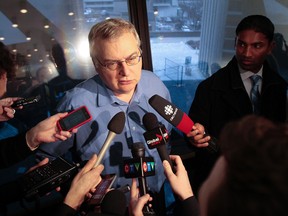 Budget Chief Mike Del Grande speaks to the media as City council meets to discuss the 2012 city budget January 17, 2012. (Dave Abel/Toronto Sun)