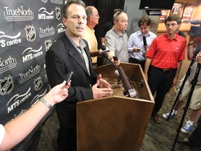 Winnipeg Jets GM Kevin Cheveldayoff (at podium) and the team's hockey operations department will be making some important decisions ahead of the Feb 27, 2012, NHL trade deadline. (WINNIPEG SUN)