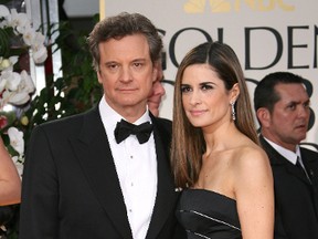 Colin Firth and his wife Livia pose for photographers at the 69th Annual Golden Globe Awards held at The Beverly Hilton Hotel in Los Angeles,Jan. 15, 2012. (WENN.COM)