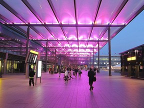 People arrive at departures at Heathrow Airport Terminal 3, in west London November 30, 2011. REUTERS/Paul Hackett