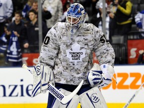 Toronto Maple Leafs goalie Jonas Gustavsson skates during the warm-up wearing a camouflage jersey for Canadian Forces Appreciation Night against the New York Rangers in Toronto January 14, 2012. (REUTERS/Mike Cassese)
