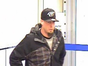 On Tuesday Jan. 17, 2012, at approximately 3:35 pm, a lone male suspect entered a bank situated along the 1500 block of Bank St, (near Heron Rd). The suspect produced a note making a demand for cash.  The suspect obtained an undisclosed quantity of cash and fled the area on foot.  No injuries were reported.  The suspect is shown here in this photo.
(Submitted photo)