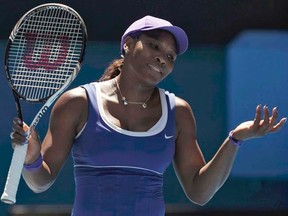 Serena Williams reacts during her singles match against Ekaterina Makarova at the Australian Open in Melbourne on Monday, Jan. 23, 2012. (REUTERS/Darren Whiteside)