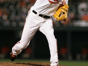 Reliever Koji Uehara pitches against the Angels in Baltimore, Md., July 23, 2011. (JOE GIZA/Reuters)