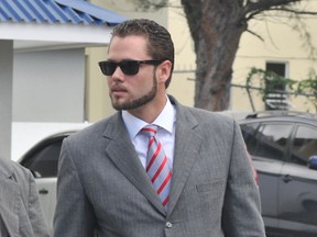 Chris Tavares Finson is the lawyer representing Stephanie and Alphonso Warren durin a court appearance in Kingston, Jamaica on Tuesday. Both are accused of failing to bury a child and concealing death after the body of their two-year-old son was found in a suitcase inside a home in Jamaica.(SPECIAL TO THE SUN)