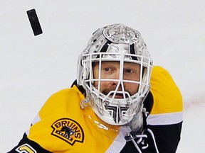 Goalie Tim Thomas has been both applauded and called out for skipping the Bruins' visit to the White House on Monday. (File photo)