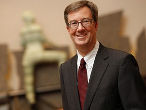 Jim Watson poses in council chambers Tuesday, November 30, 2010, a day ahead of being officially sworn in as the city's new mayor. (Darren Brown/Ottawa Sun)