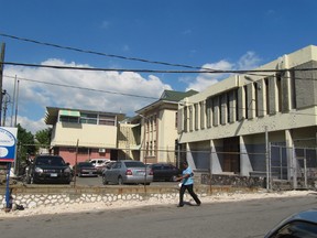 Stephanie and Alphonso Warren face trial in this Jamaican court house after the body of their 2-year-old son, Joshua, was found stuffed in a suitcase in their ramshackle Kingston home almost two weeks ago.