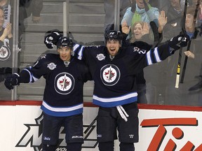 Jets forward Evander Kane (left) is one of only a few Jets on pace for a career year in terms of goal scoring. Leading point scorer Blake Wheeler (right) is well off the goal pace from his career year. (BRIAN DONOGH/WINNIPEG SUN FILES)