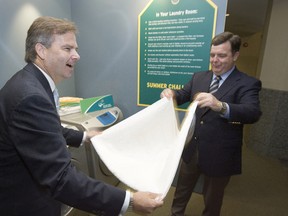 Toronto Hydro CEO Anthony Haines, left, and Energy Minister Dwight Duncan. (Sun files)