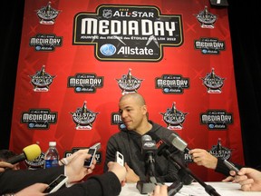 Jarome Iginla of the Calgary Flames talks with the press during the 2012 NHL All-Star Game Player Media Availability at the Westin Ottawa on January 27, 2012 in Ottawa. Christian Petersen/Getty Images/AFP