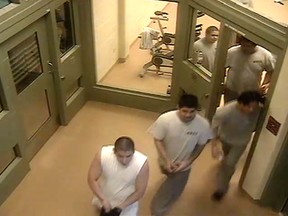 Video shows convicts leaving the exercise room at Milner Ridge to chase down a fellow inmate. (HANDOUT)