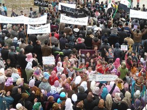 Demonstrators protest against Syria's President Bashar al-Assad after Friday prayers in Hula near Homs, January 27, 2012. REUTERS/Handout