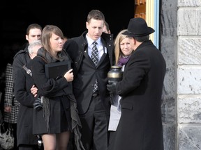 The children of Diane Gregoire, Elizabeth and Francis Laplante, at the funeral of their mother, Jan. 28, 2012. JOCELYN MALETTE/QMI Agency