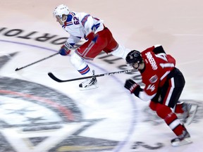 New York Rangers Carl Hagelin and Ottawa Senator Colin Greening compete in the Fastest Skater competition at the 2012 Molson Canadian NHL All-Star Skills Competition at Scotibank Place Saturday January 28,2012. (ERROL MCGIHON/OTTAWA SUN)