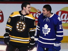 Boston Bruins Tyler Seguin (L) talks with Toronto Maple Leafs Joffrey Lupul before the NHL All-Star hockey skills competition in Ottawa January 28, 2012. REUTERS/Chris Wattie