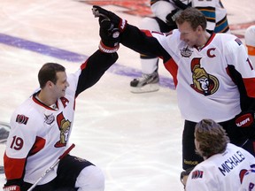 Senators Jason Spezza, left, and Daniel Alfredsson high-five during the skill competition at Scotiabank Place on Saturday (DARREN BROWN/OTTAWA SUN)