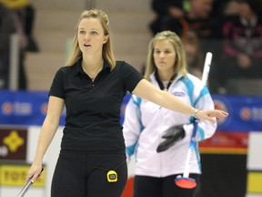 Morden skip Chelsea Carey (left) calls a shot during action against St. Vital skip Jennifer Jones's team at the final of the Scotties Tournament of Hearts women's provincial curling championship at the PCU Centre in Portage la Prairie on Sun., Jan. 29, 2012.