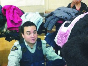 RCMP Const. Ryan Merasty helped arrange donations for a clothing drive, at Garden Hill First Nation, to be flown in with the help of the Morden Police Service. (TAMARA KING/Winnipeg Sun)