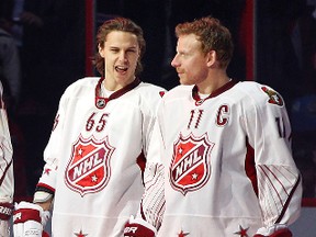 Daniel Alfredsson and Erik Karlsson at the end of the 2012 Tim Hortons NHL All-Star Game at Scotibank Place in Ottawa. Saturday January 29,2012. (ERROL MCGIHON/OTTAWA SUN).