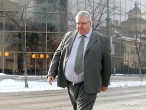 Mark Stobbe, a former Manitoba and Saskatchewan government employee accused of killing his wife Beverley Rowbotham at their home in St. Andrews in 2000, leaves the Law Courts on Mon., Jan. 30, 2012. Stobbe is on trial for second-degree murder. (Jason Halstead, Winnipeg Sun files)
