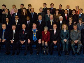 Toronto city council surrounds Mayor Rob Ford, front row, centre.