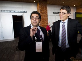 Calgary Mayor Naheed Nenshi, left, and Vancouver Mayor Gregor Robertson take a break during the Cities Summit 2012 at Convention Centre West in Vancouver, February 1, 2012. (Carmine MarinelliQMI Agency)