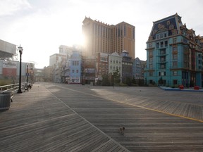 The boardwalk at Atlantic City, New Jersey, is seen empty of vacationers August 26, 2011. Hurricane Irene is expected to hit the U.S. East Coast over the weekend.    REUTERS/Jason Reed