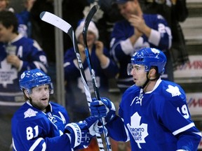 Toronto Maple Leafs forward Joffrey Lupul (R) celebrates his goal against the Tampa Bay Lightning with forward Phil Kessel in Toronto January 3, 2012. (REUTERS/Mike Cassese)