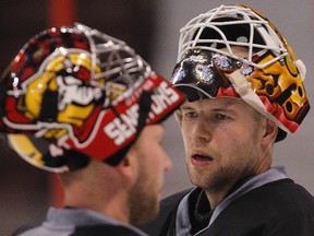 Senators goalies Alex Auld, left, and Craig Anderson. TONY CALDWELL/Ottawa Sun