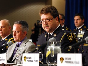 Detective Staff Sergeant Frank Goldschmidt , OPP Provincial Strategy Co-ordinator (Glasses) speaks at presser. The OPP held a press conference, Thursday  Febuary 2, 2012,  detailing the Provincial strategy to protect children from sexual exploitation and abuse on the internet. 
(CRAIG ROBERTSON/QMI AGENCY)