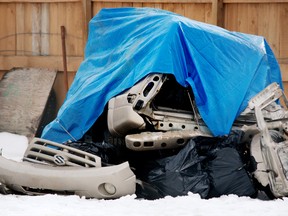 A tarp covers a wreck after an Edmonton family of four died while heading to Barriere, B.C.  RCMP PHOTO SUPPLIED