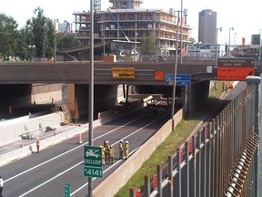 Several cars had to brake to avoid being crushed after a massive beam supporting a tunnel in downtown Montreal fell on July 31, 2011. (QMI Agency files)